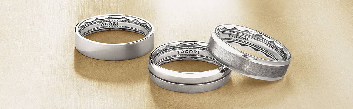 Three TACORI Classic collection Men's Wedding Bands on Yellow background