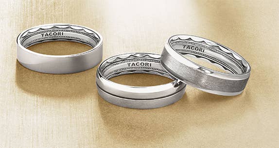 Three TACORI Classic collection Men's Wedding Bands on Yellow background